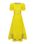 Fanm Mon Aysin Dress.
Yellow dress with floral embroidery on a white background