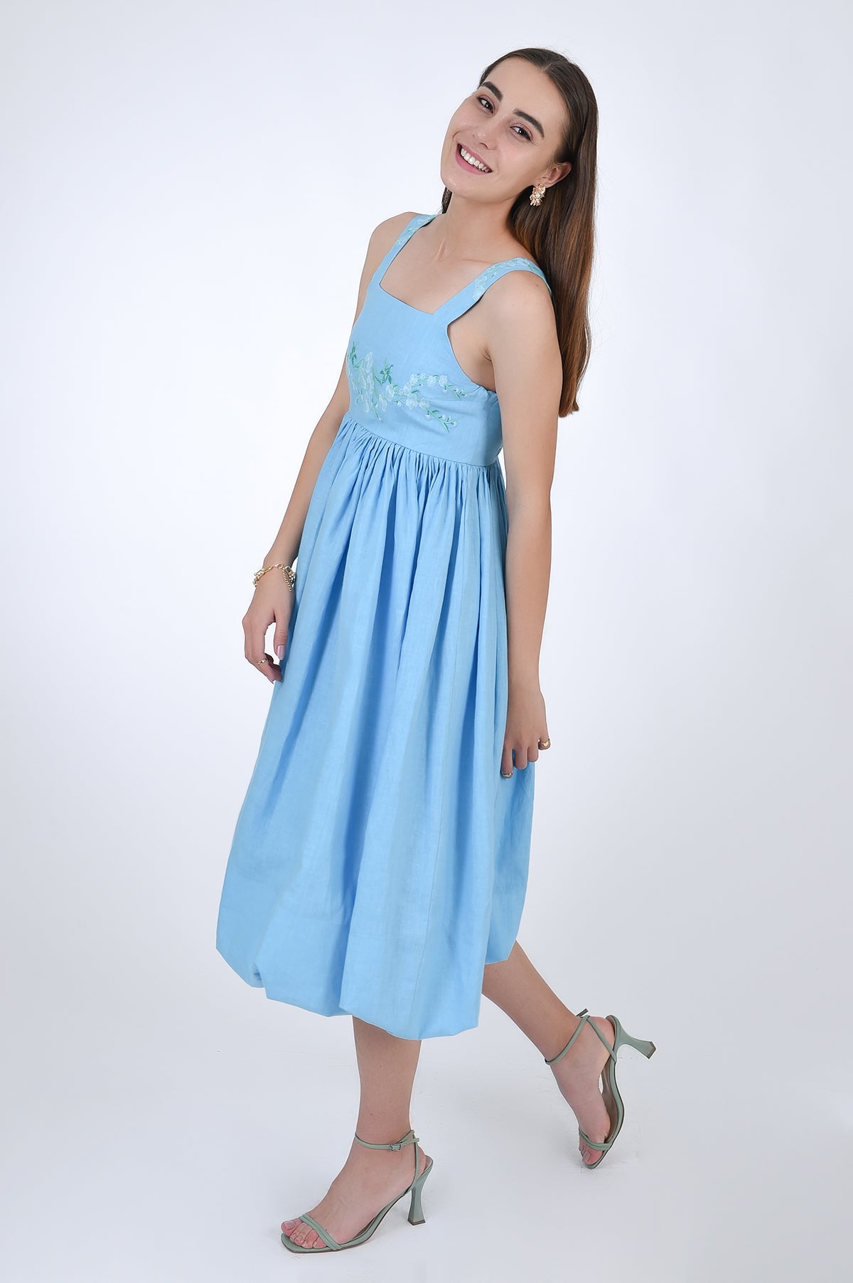  Meliza  Linen Balloon Skirted Dress with Embroidered Detail, Side View. 