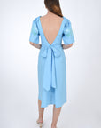Naif Back View, showcasing length and bow feature.