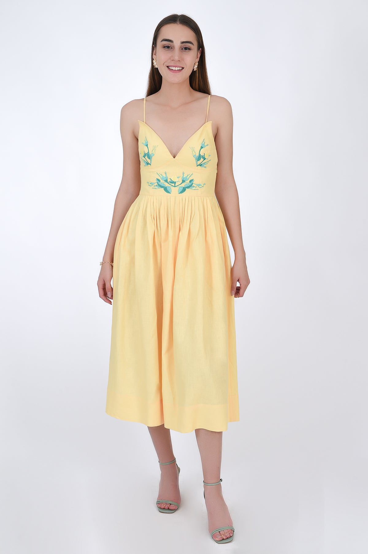 Fanm Mon Emile Embroidered Linen Dress, Front View. Midi Length Linen Dresswith a  flattering silhouette features spaghetti straps, an elegant V-neck line.