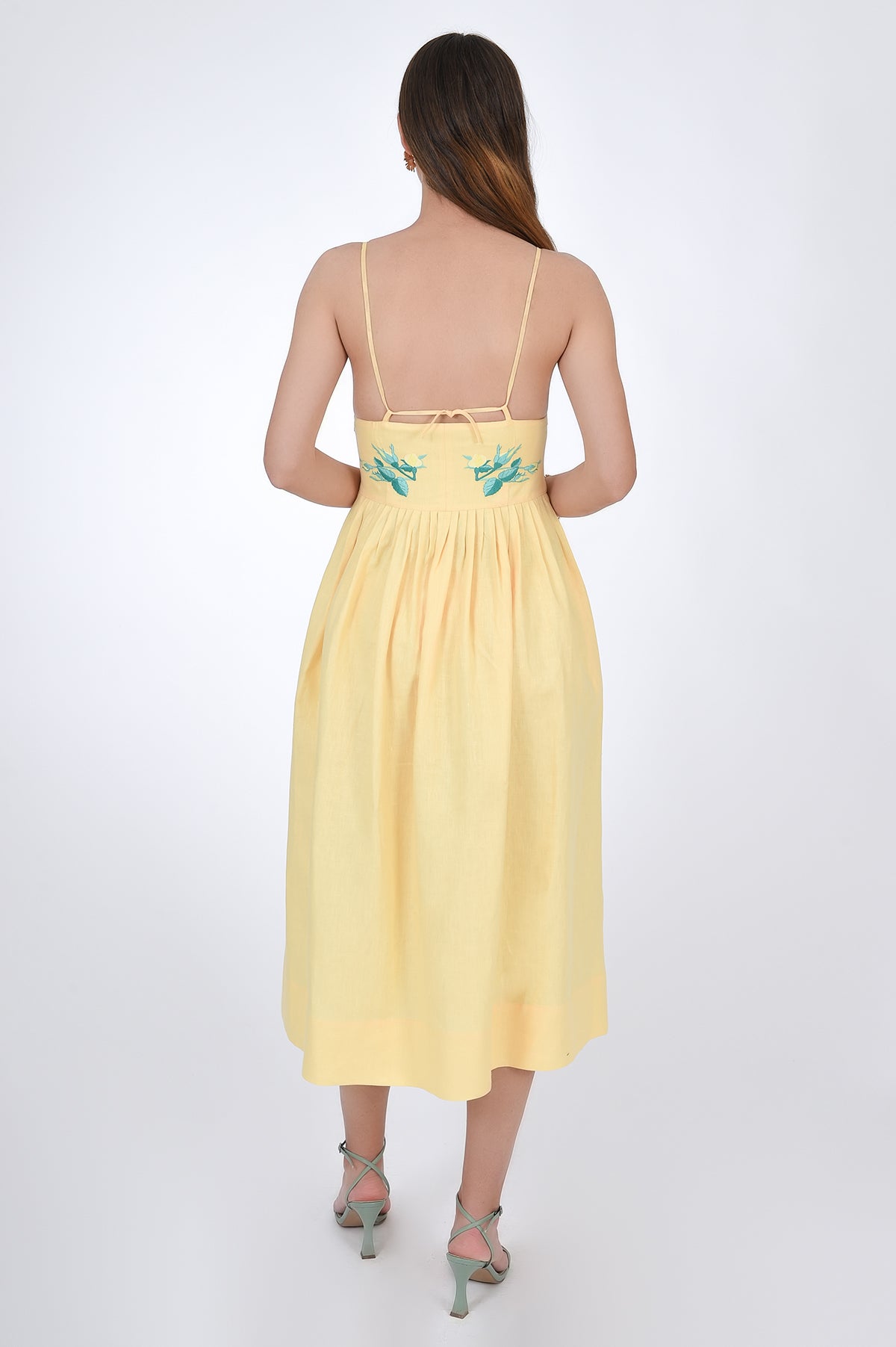 Fanm Mon Emile Embroidered Linen Dress, Back View. Midi Length Linen Dresswith a flattering silhouette features spaghetti straps.