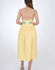 Fanm Mon Emile Embroidered Linen Dress, Back View. Midi Length Linen Dresswith a flattering silhouette features spaghetti straps. 