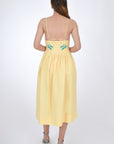 Fanm Mon Emile Embroidered Linen Dress, Back View. Midi Length Linen Dresswith a flattering silhouette features spaghetti straps.