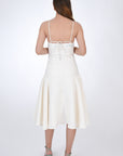 Back View of the Linen Gest Dress with Tie Strap Detail.