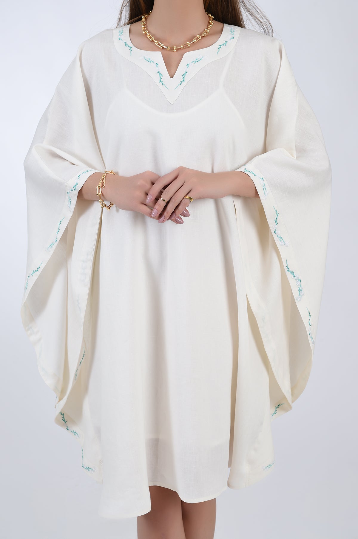 Fanm Mon Lage Linen Kaftan Dress in Ivory, Embroidery detail on trim.