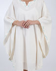 Fanm Mon Lage Linen Kaftan Dress in Ivory, Embroidery detail on trim.