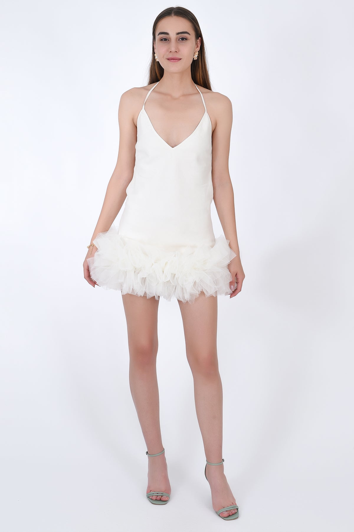 Fanm Mon Electra Linen mini dress, front view. Features a halter neckline, spaghetti straps, open back, and tulle hemline. The dress is also detailed with embroidery.