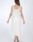 Fanm Mon Citra Linen & Tulle Midi Dress, back view. Featuring embroidery detail at the chest, and tulling at the waist.  