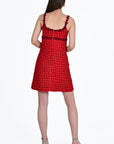 Emel Dress Back View showcase wraparound embroidery details and back zipper