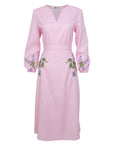 Pink dress with floral embroidery on a white background. Famn Mon Long Sleeve Ezra Dress.