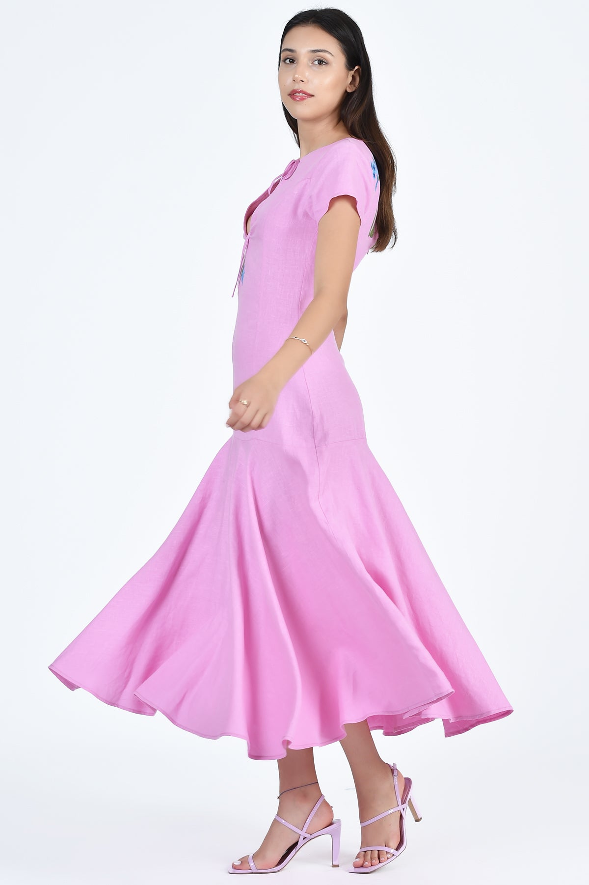 Fanm Mon Barbara Dress in Plum Side View of Tuliped Skirt and Cap Sleeves (Wombman Collection)