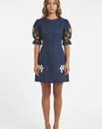 Fanm Mon Cansel Dress featuring tulip and jasmine embroidery, puff sleeves, removable belt, and A-line mini silhouette.