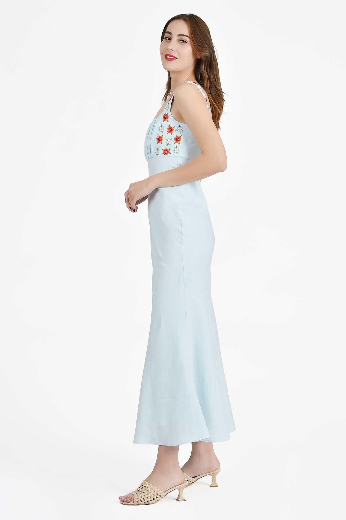 Side View of the Lulu Dress showcasing the Floral Embroidery