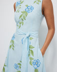 Fanm Mon Medina Embroidery Detail of Blue and Yellow florals with green textured leaves