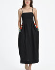 Michou Dress in Black Front View showcasing Floral Embroidery and Side Pockets