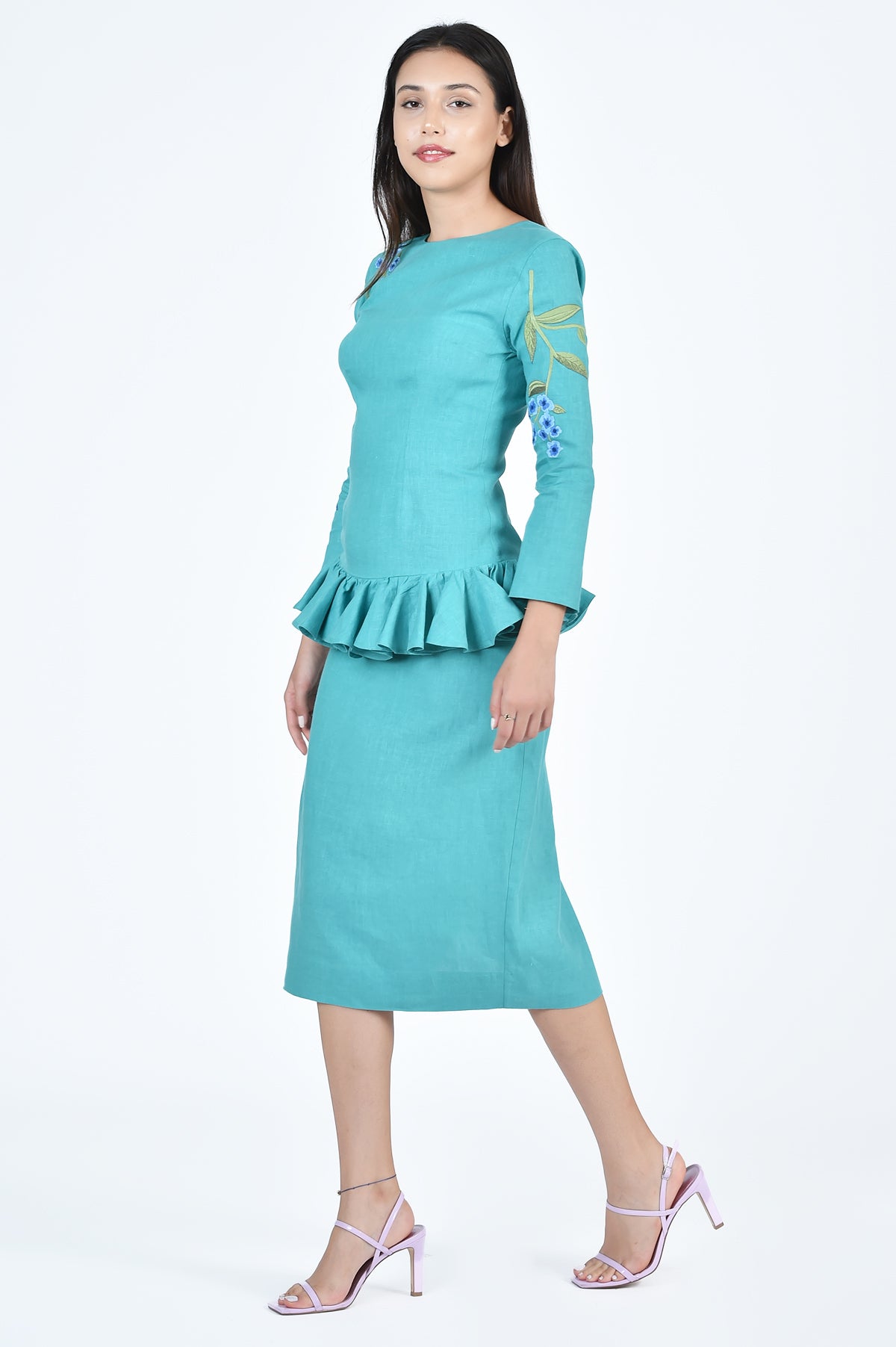 Susan Dress in Teal with Drop Peplum Waist Detail and Blue Floral Embroidery