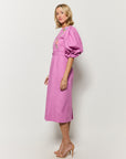 Sideview of the Fanm Mon Santiago Dress in Cotton Fabric with puff sleeves.
