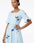 Close-up of the Yaprak Dress highlighting intricate hydrangea embroidery and botanical motifs.