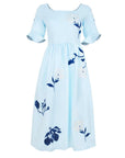 Yaprak Dress by Fanm Mon featuring hand-placed hydrangea embroidery, square neckline, flared sleeves, and a flowing midi silhouette.