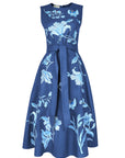 Fanm Mon Gera Dress in indigo blue featuring tonal blue botanical embroidery, butterfly motifs, a self-tie waist, and A-line midi skirt.