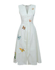 White and green striped button front sleeveless dress with butterfly embroidery on a white background. Fanm Mon Gunay Dress.