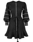 Fanm Mon Mel Dress back view featuring voluminous embroidered sleeves, a self-tie waist and ruffle hem
