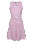 Pink Skirt and top with butterfly designs on a white background. Fanm Mon Nisa Set.