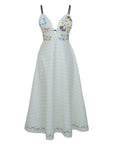Fanm Mon Nur Dress with white and green stripes and floral embroidery.