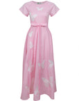 Pink dress with butterfly patterns on a white background. Fanm Mon Pelin Dress.