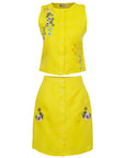 Yellow sleeveless top and skirt set with floral embroidery on a white background. Fanm Mon Sema Set.