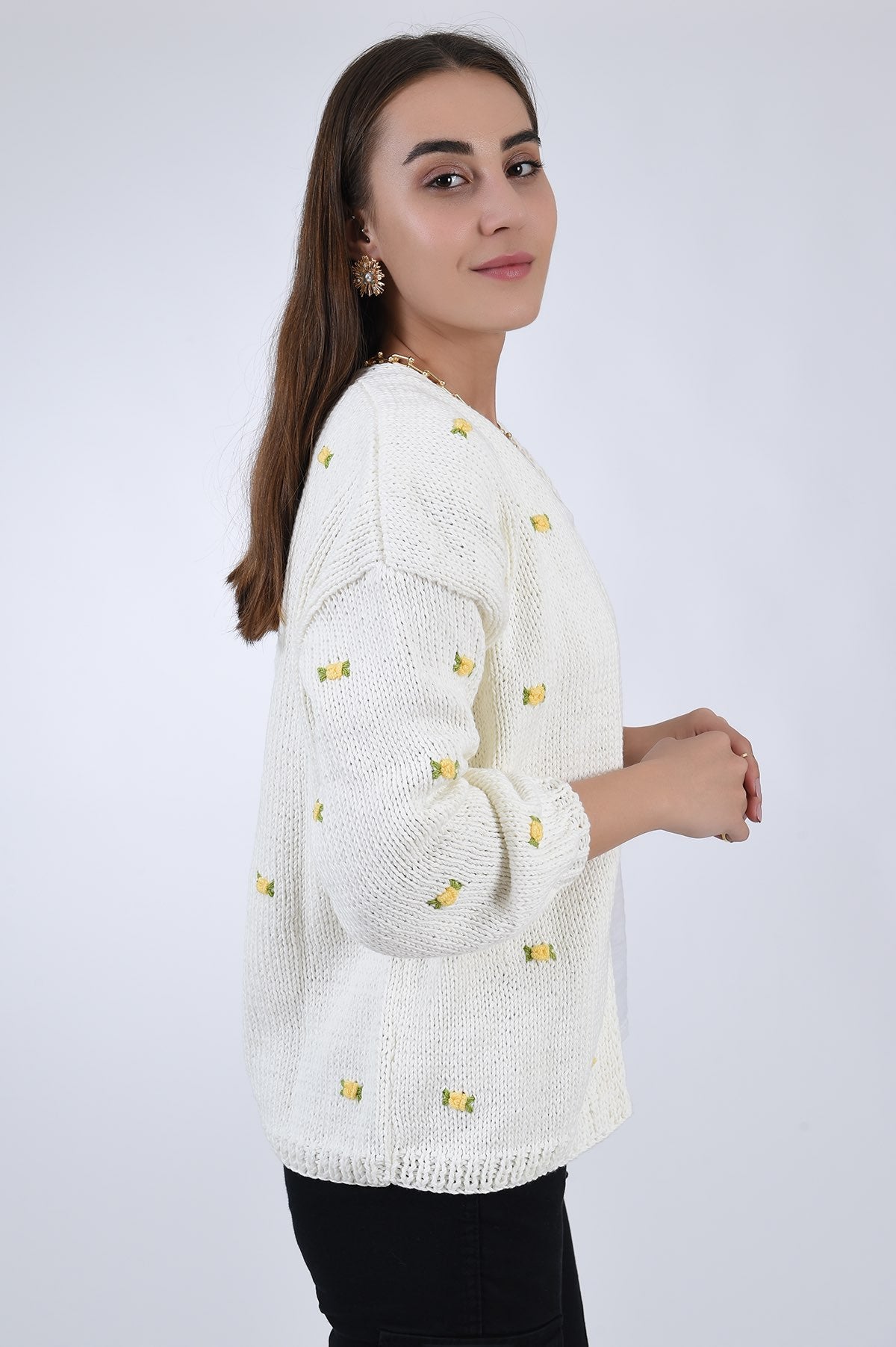 Fanm Mon Winter Bloom Yellow Hand knit Cardigan with all love floral embroidery detail, side view.