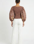 Back view of Fanm Mon Astrid Top in espresso with smocked bodice and embroidered sleeves