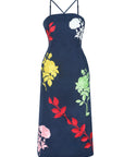 Fanm Mon Pout Dress with colorful botanical embroidery, fitted midi silhouette and crossover straps