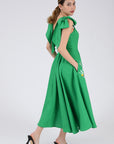 Side View of the Nilen Dress by Fanm Mon in Kelly Green