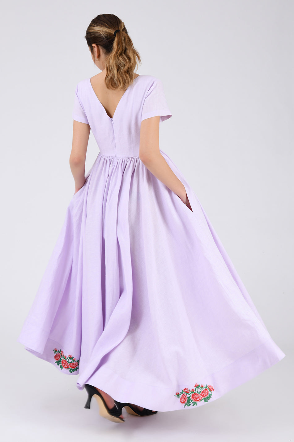 Back View of the Artem Dress showcasing drop v back