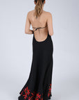 Back View of the Koreli Maxi Dress in Black