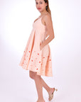 Fanm Mon Mella Dress, Side View. Showcasing embroidery detail and side pockets.