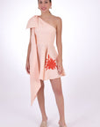 Fanm Mon Eftelya Linen Dress (Front View with Bow). Mini One Shoulder Linen Dress with a full circle skirt, detachable bow detail, hidden side zipper, and embroidery on the skirt.