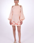 Fanm Mon Gizem Mini Long Sleeve Linen Dress, featuring embroidery on bottom hem. Front View.