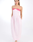 Fanm Mon Linen Lorr Midi Dress in Light pink, showcasing hand-embroidered floral appliques in harmonizing hues along the neckline. Front View.