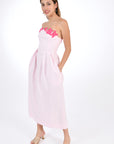 Fanm Mon Lorr Linen Dress in Light pink, side view.