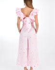 FANM MON ANAIS 2 Piece Linen Top and Pants Set. Back view, with detail of bow and button closure, and wide-leg pants boasting a matching embroidery.
