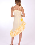 Fanm Mon Freda Midi Linen Dress, with flared asymmetrical ruffled hemline. (Back View)