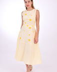 Fanm Mon Midi Linen Elvan Dress. This beautiful A-line silhouette is crafted in breathable linen and features stunning front and back embroidery, side pockets, and a classic belted waist. Front View.