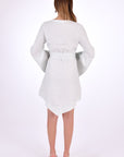 Fanm Mon Boze Dress Back View. Kaftan Style Linen Dress with wide kimono embroidered sleeves and handkerchief hem and tie front. Easy slip-on wear, mini length loose fit dress.
