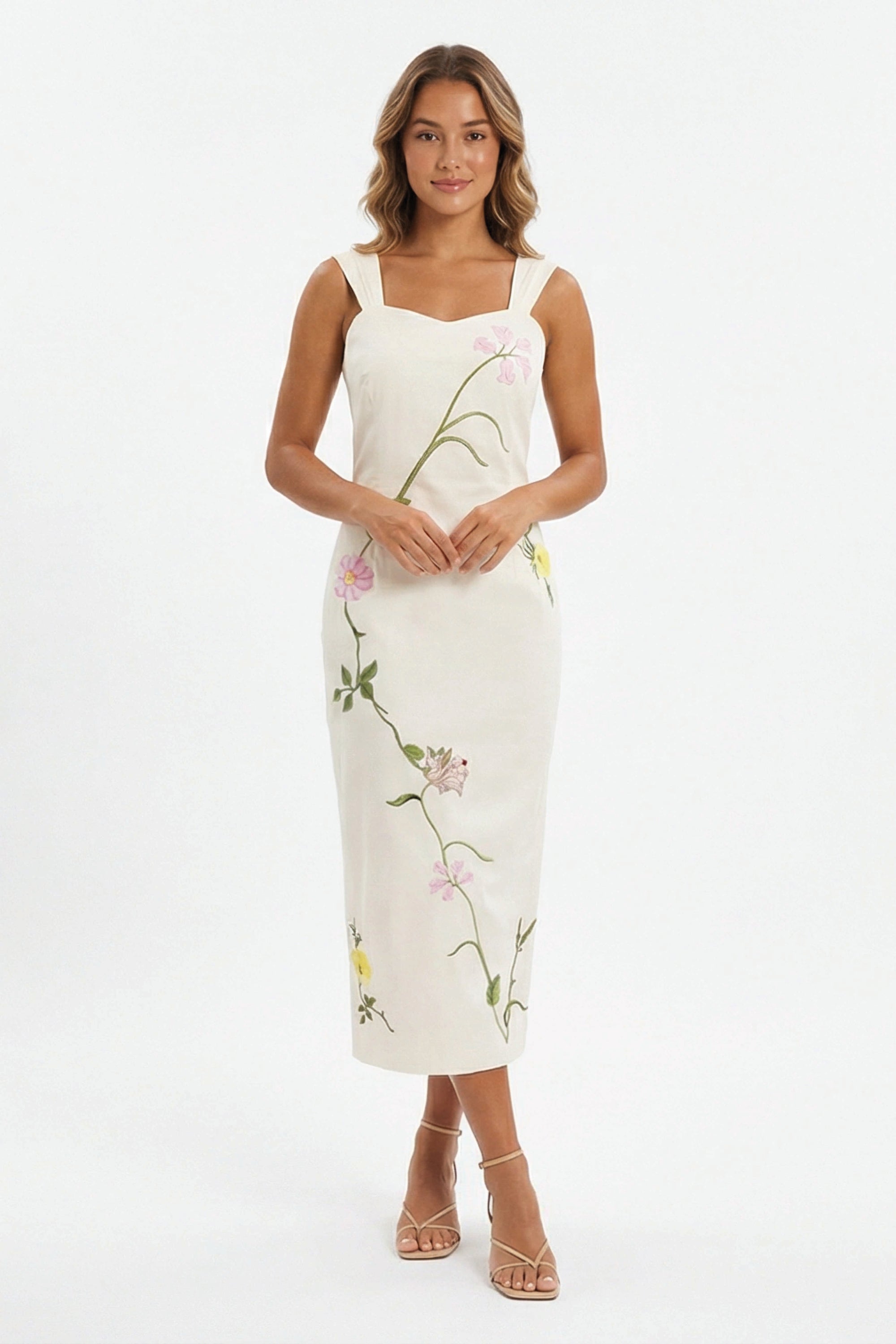 Fanm Mon Bafra Dress featuring botanical floral embroidery, a sweetheart neckline, wide straps, and an elegant column silhouette.