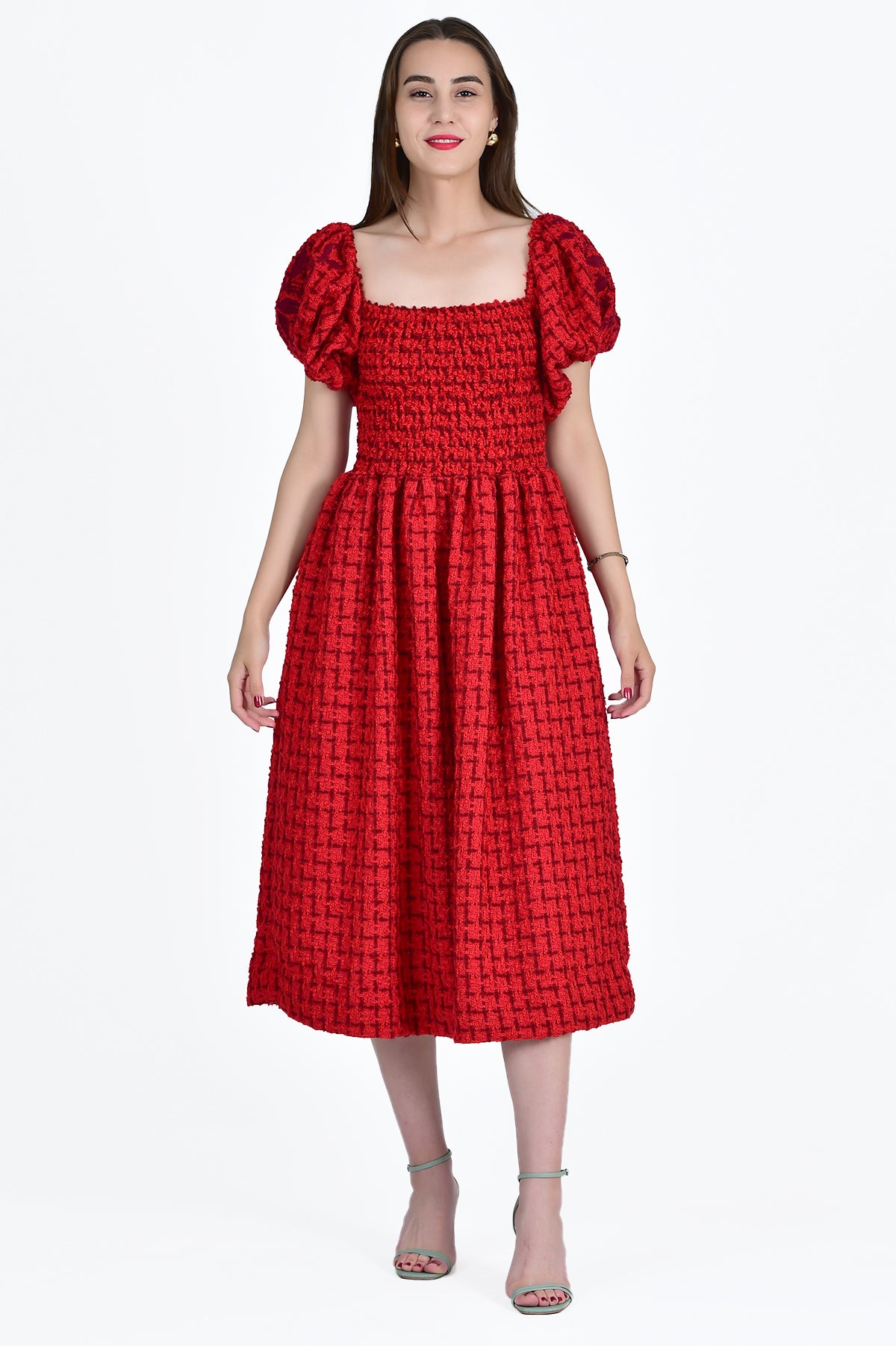 Buse Dress Showcasing on-shoulder puff sleeves and front square neckline with smocking details