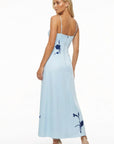 Back view of the Fanm Mon Carmen Dress showcasing the flowing silhouette, adjustable straps, and embroidered floral detailing.