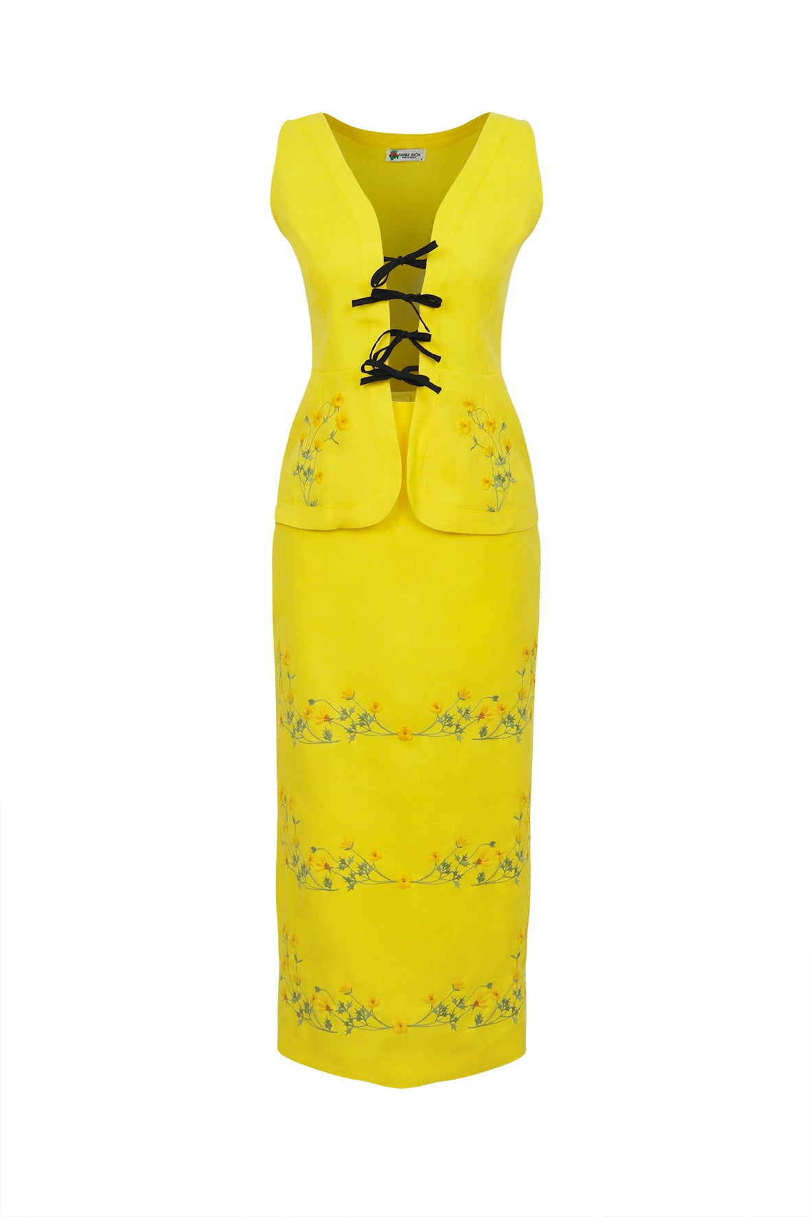 Fanm Mon Cenan Set on white background. Floral embroidery with tie front top.  