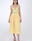 Fanm Mon Emile Embroidered Linen Dress, Front View. Midi Length Linen Dresswith a  flattering silhouette features spaghetti straps, an elegant V-neck line.